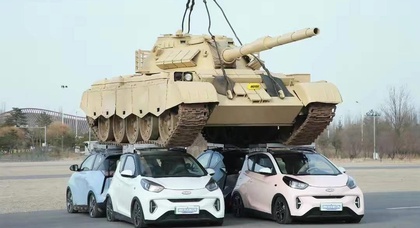 Chinese automaker tests the strength of cars by mounting a 30-ton tank on their roofs