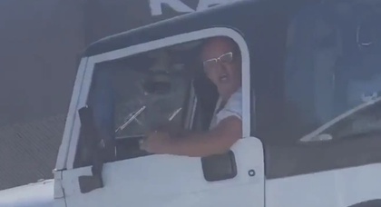 Instant Karma: Racist road rage driver crashed into a wall on the freeway (video)