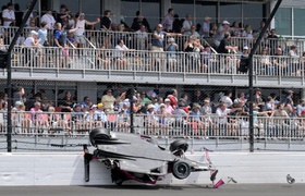 Wrecked Racecar’s Wheel Goes Flying Over Crowd, Smashes Into Parked Car At Indy 500