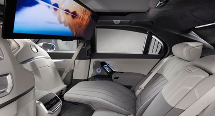 BMW to prevent passengers from getting motion sickness with ceiling mounted theater display