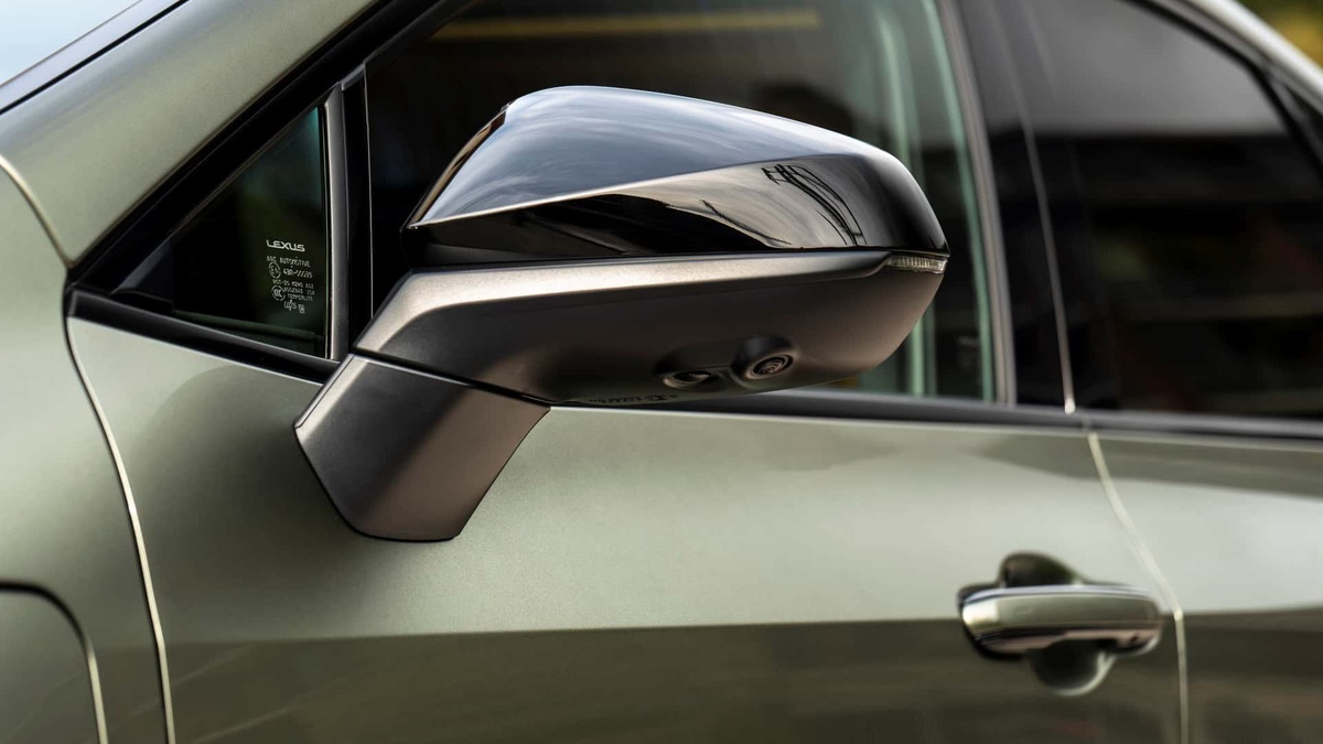 Side mirror with integrated camera sensor