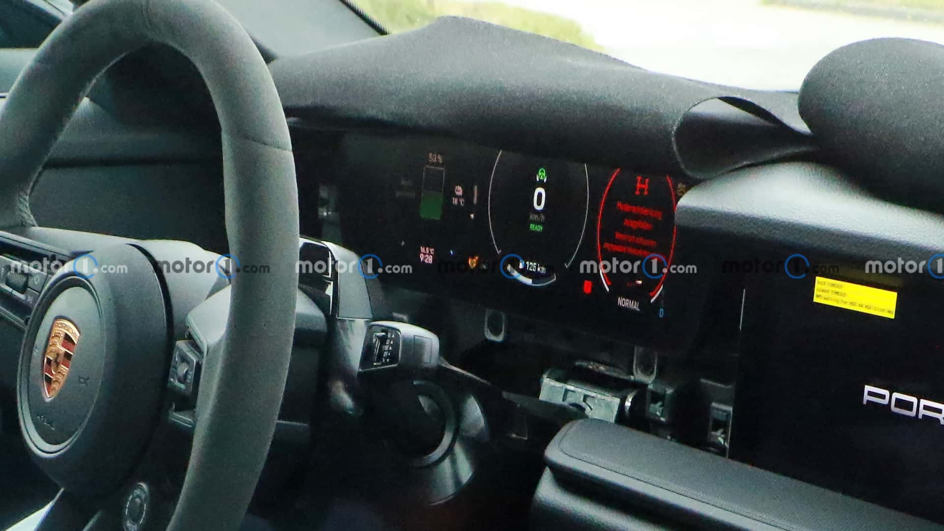 New spy photos show electric Porsche Boxster with dual-screen dashboard design